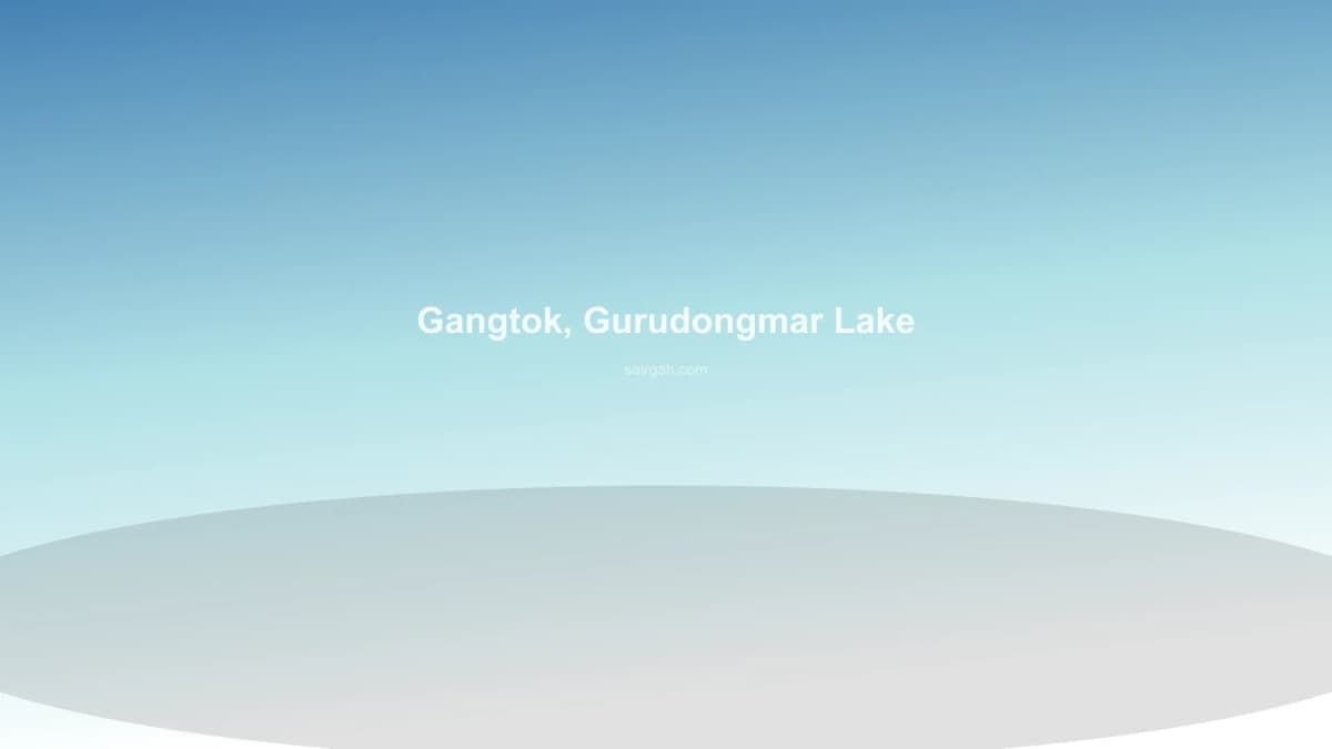 View of the blue waters of Gurudongmar Lake with snow mountains during Sairgah Serene North Sikkim Scenic Circuit